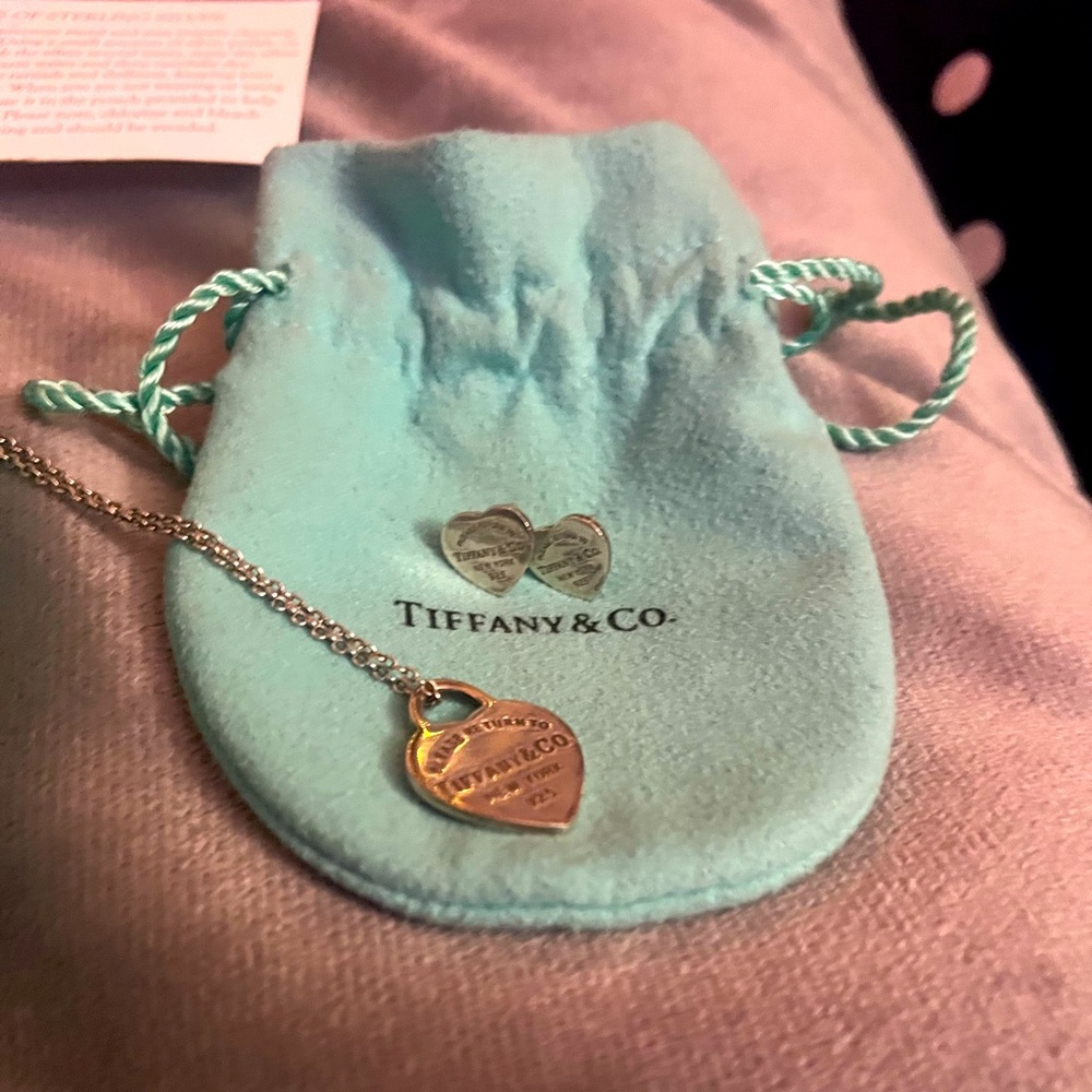 Tiffany & Co. necklace and earrings with box care instructions and storage bag.